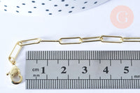Gold-tone rectangular link chain with lobster-claw clasp, 46.5cm long, displayed with a ruler for scale, part of Collier Chaine laiton doré clair collection.