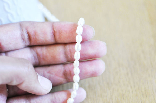 EP EP- Perle naturelle blanche grade A 4-5mm, x1 fil (G2836)