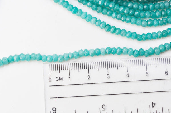 EP Perle abacus jade teinté bleu turquoise 4x2mm,fil de 38,35 cm G4710