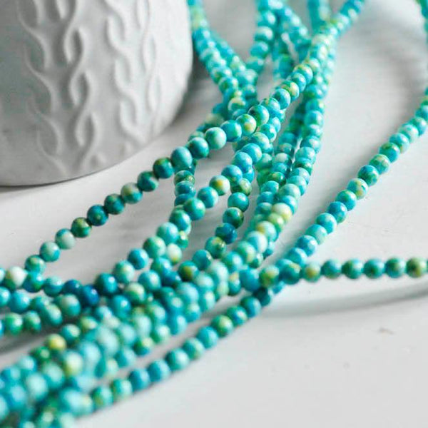 EP Perle jade océan naturel bleue 4mm, x1 fil (G1644)