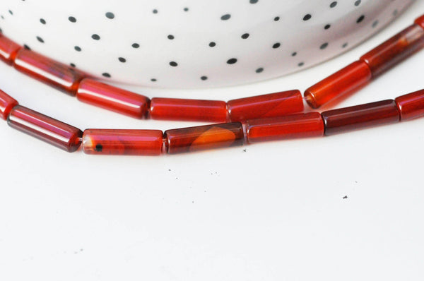 EP -Perle tube cornaline naturelle 13-14mm, x1 fil de 38cm G4370