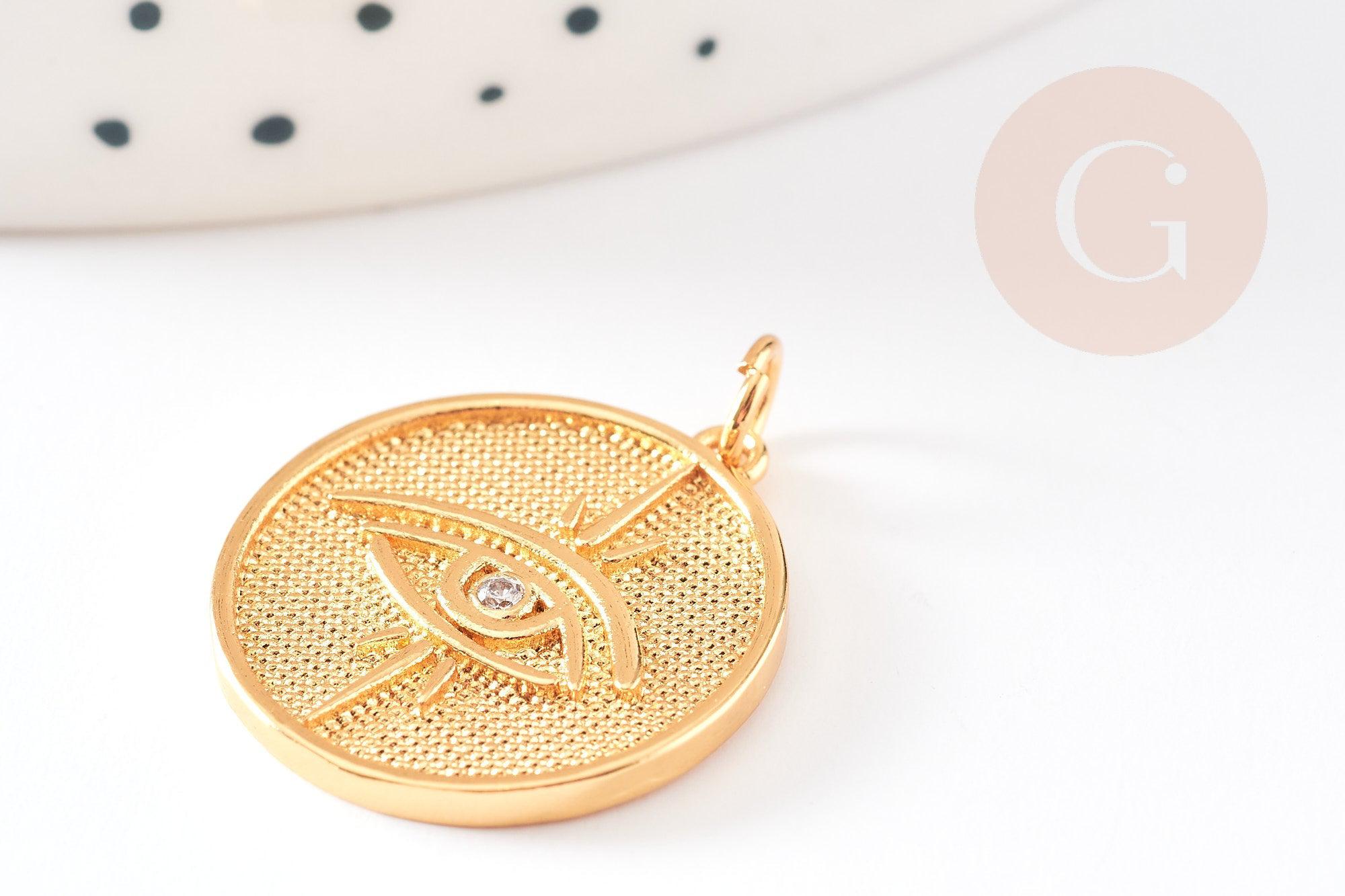 Pendentif rond oeil Egyptien laiton doré 18K texturé 22mm, x1 (G4853)