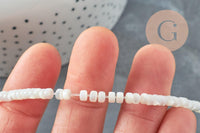 Perle nacre blanche naturelle heishi 2x4mm, x1 fil de 20cm (G4475)