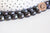 Perle naturelle culture d'eau douce noire ovale 8-10mm, x1 fil (G6285)