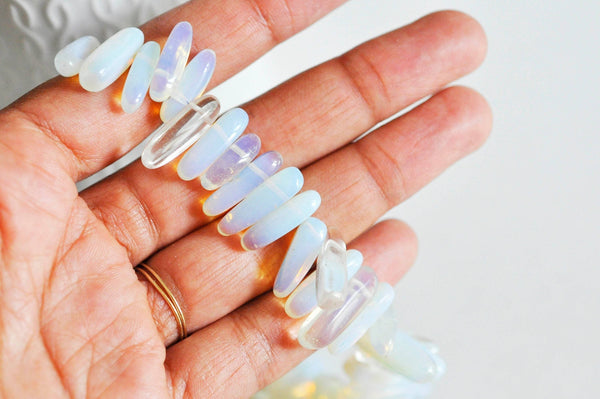 Perle ovale opalite roulée synthèse 13-22mm, x1 fil (G1476)