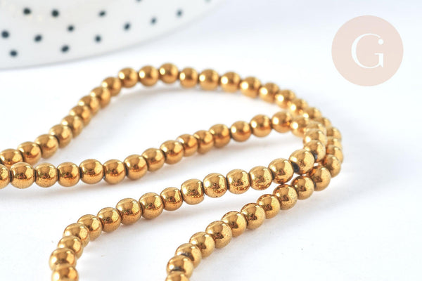 Perle ronde hématite de synthèse dorée 4mm, x1 fil de 39cm (G7404)