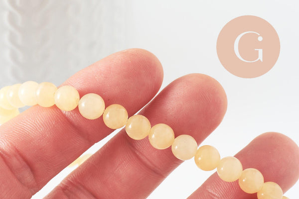 Perle ronde jade naturel jaune clair 6mm, x1 fil de 19cm (G2085)