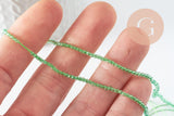 Perle ronde verre facettée transparente vert clair 2mm, x1 fil de 37cm (G7445)