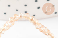 Perles toupies cristal orange transparent irisé 3.5x2.5mm, x1 fil 25cm (G8595)