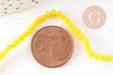 Perles toupies verre jaune facette 3mm, x1 fil de 38cm (G2669)